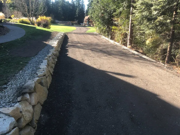 Driveway with rock wall